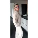 eleaka pull flore beige 3.webp